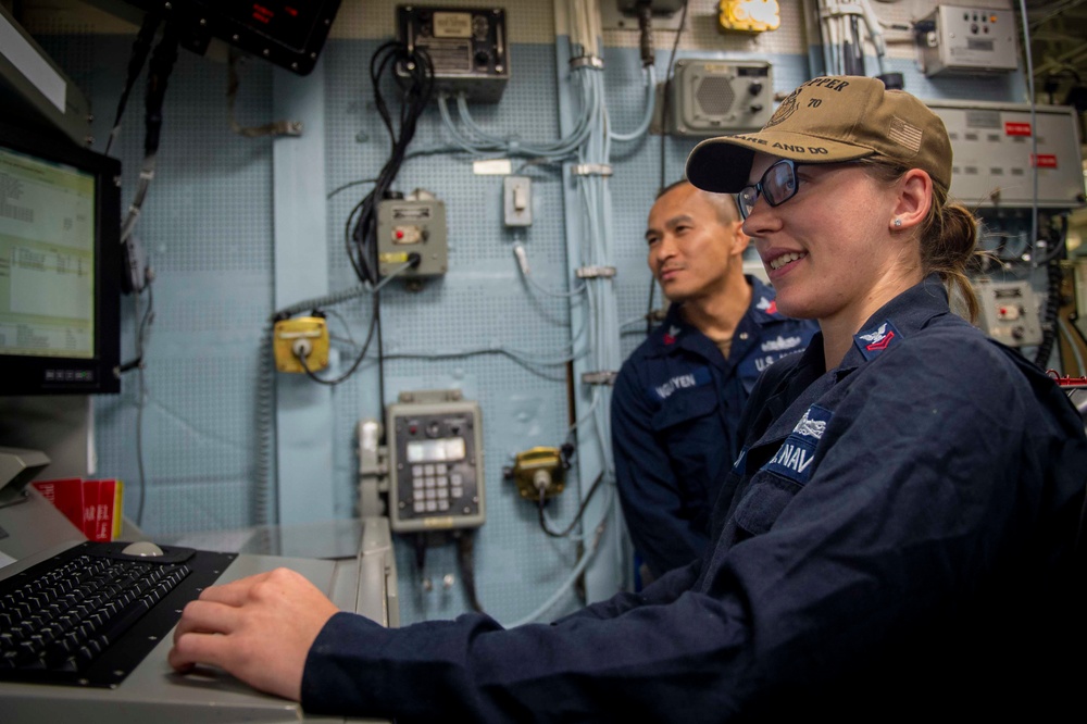 USS Hopper (DDG 70) Sailors Conduct Watch Turnover in the Pacific Ocean