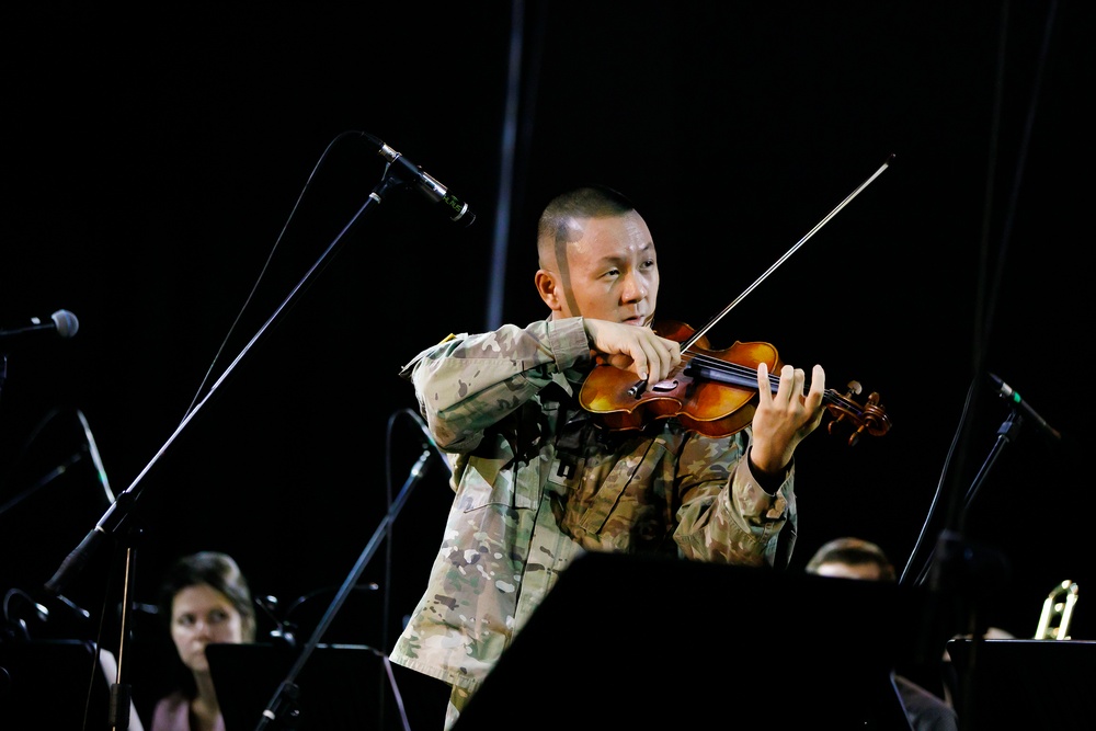 JAG officer violinist accompanies Polish Air Force Band on Polish Independence Day