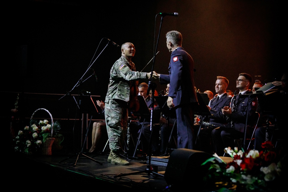 JAG officer violinist accompanies Polish Air Force Band on Polish Independence Day