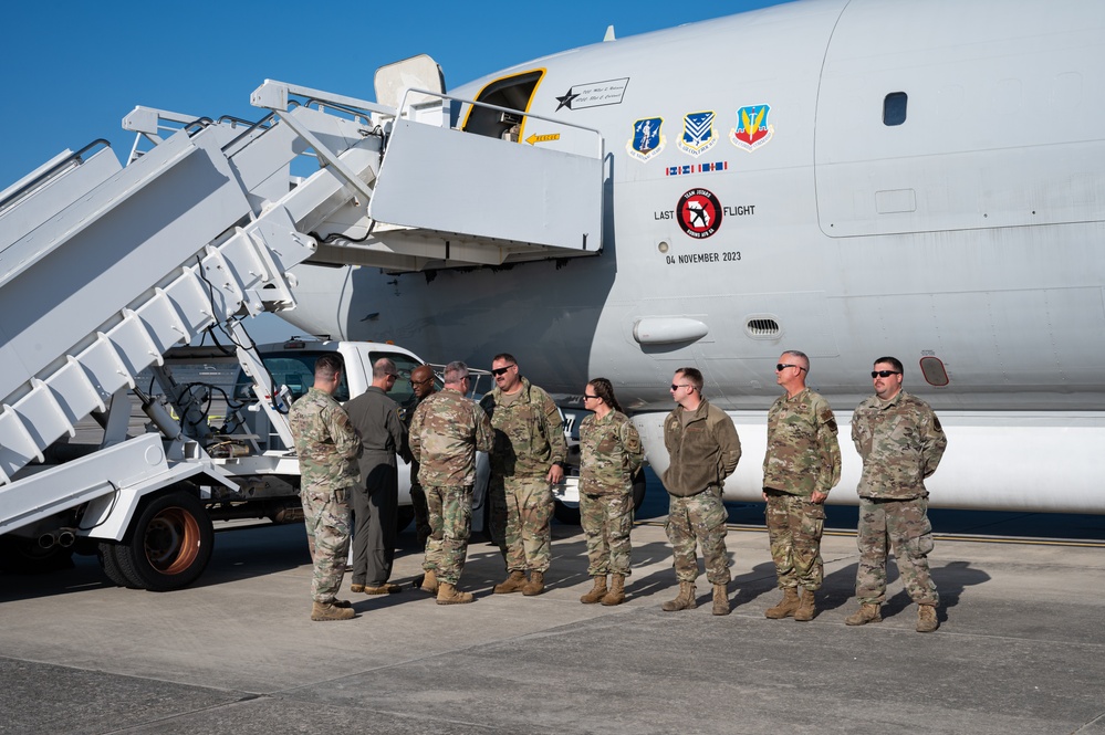 Photo of 116th Maintenance Group members receiving coins for outstanding work