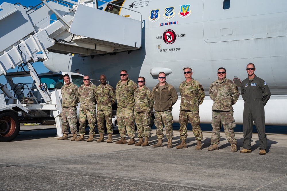 Photo of 116th Maintenance Group members receiving coins for outstanding work