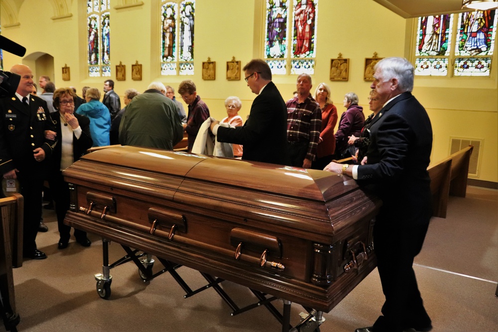 Korean War hero laid to rest in return to Wisconsin hometown after 73 years