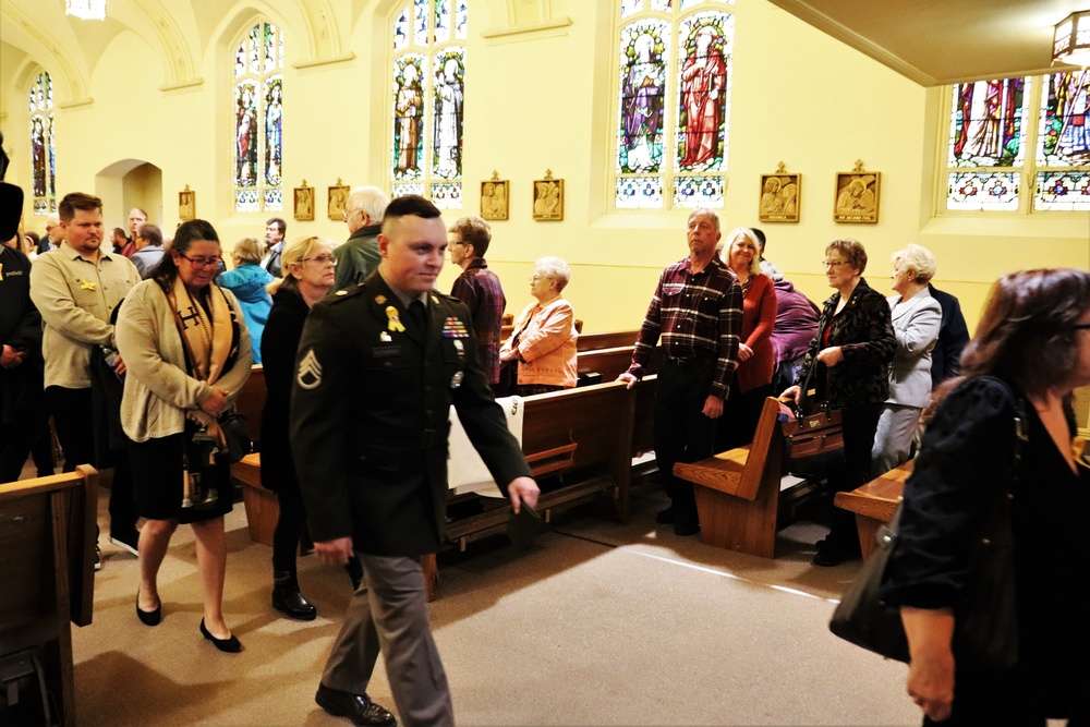 Korean War hero laid to rest in return to Wisconsin hometown after 73 years