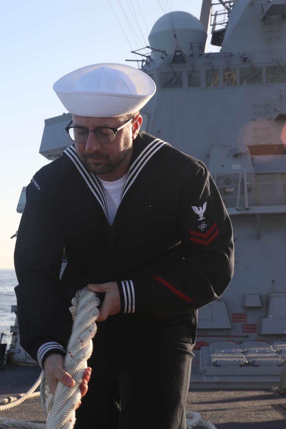 Sailors aboard the USS Rafael Peralta (DDG 115) conduct a Sea and Anchor detail in Donghae, South Korea