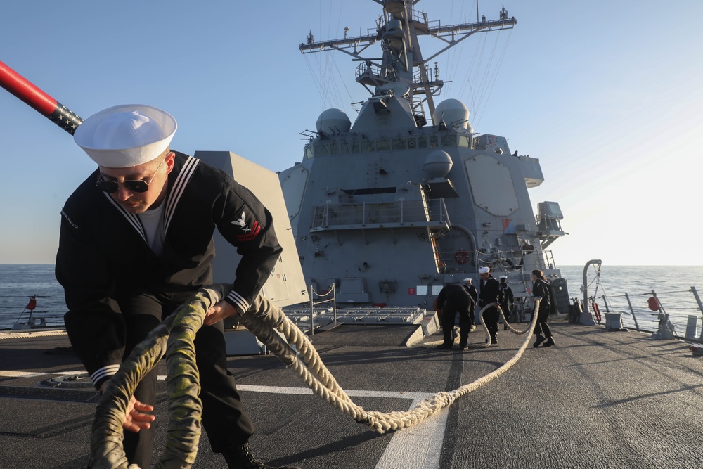 Sailors aboard the USS Rafael Peralta (DDG 115) conduct a Sea and Anchor detail in Donghae, South Korea