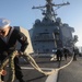 Sailors aboard the USS Rafael Peralta (DDG 115) conduct a Sea and Anchor detail in Donghae, South Korea