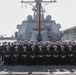 Officers aboard the USS Rafael Peralta (DDG 115) pose for a picture on the foc’sle during a scheduled port visit to Donghae, South Korea