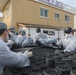 Sailors assigned to the USS Rafael Peralta (DDG 115) work with sailors assigned to the Republic of Korea Navy Daegu-class frigate ROKS Pohang (FFG-825) and the Korean government to provide coal to local houses in Donghae, Republic of Korea