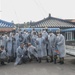 Sailors assigned to the USS Rafael Peralta (DDG 115) work with sailors assigned to the Republic of Korea Navy Daegu-class frigate ROKS Pohang (FFG-825) and the Korean government to provide coal to local houses in Donghae, Republic of Korea