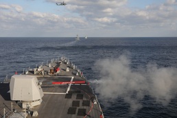 Sailors aboard the USS Rafael Peralta (DDG 115) conduct a gun shoot during a Maritime Counter Special Operations Exercise (MCSOFEX) with the Republic of Korea (ROK) Navy