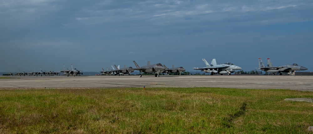 United in Strength: aircraft line the runway at Kadena Air Base