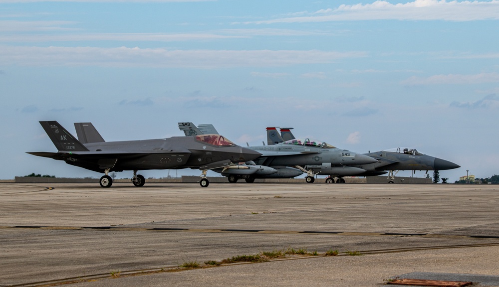 United in Strength: aircraft line the runway at Kadena Air Base