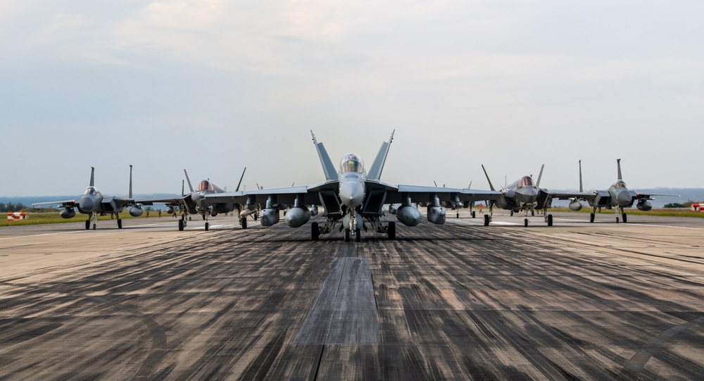 United in Strength: aircraft line the runway at Kadena Air Base