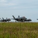 United in Strength: aircraft line the runway at Kadena Air Base