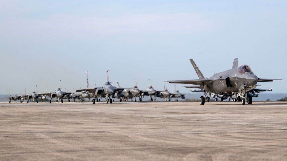 United in Strength: aircraft line the runway at Kadena Air Base