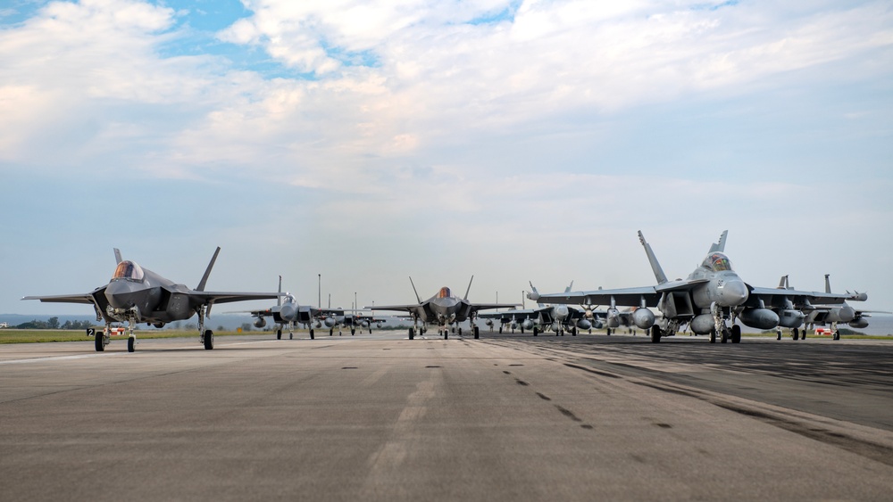 United in Strength: aircraft line the runway at Kadena Air Base