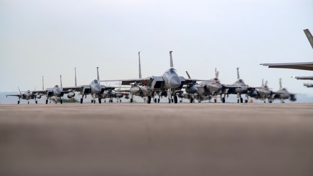 United in Strength: aircraft line the runway at Kadena Air Base