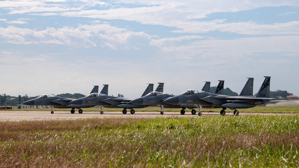 United in Strength: aircraft line the runway at Kadena Air Base