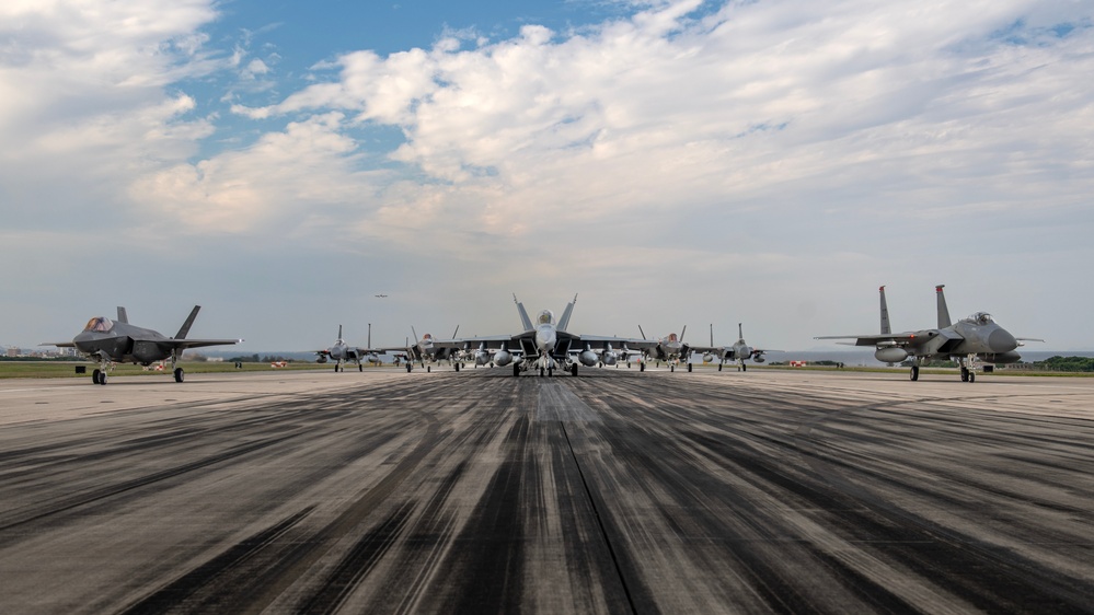 United in Strength: aircraft line the runway at Kadena Air Base