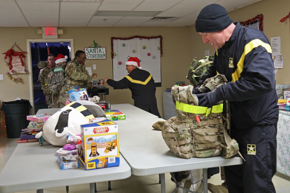 Unit Ministry Team Leads Sustainment Command to Santa’s Castle