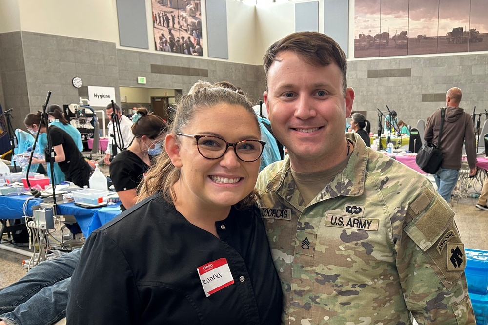 Army Guard spouse volunteers with veterans dental clinic