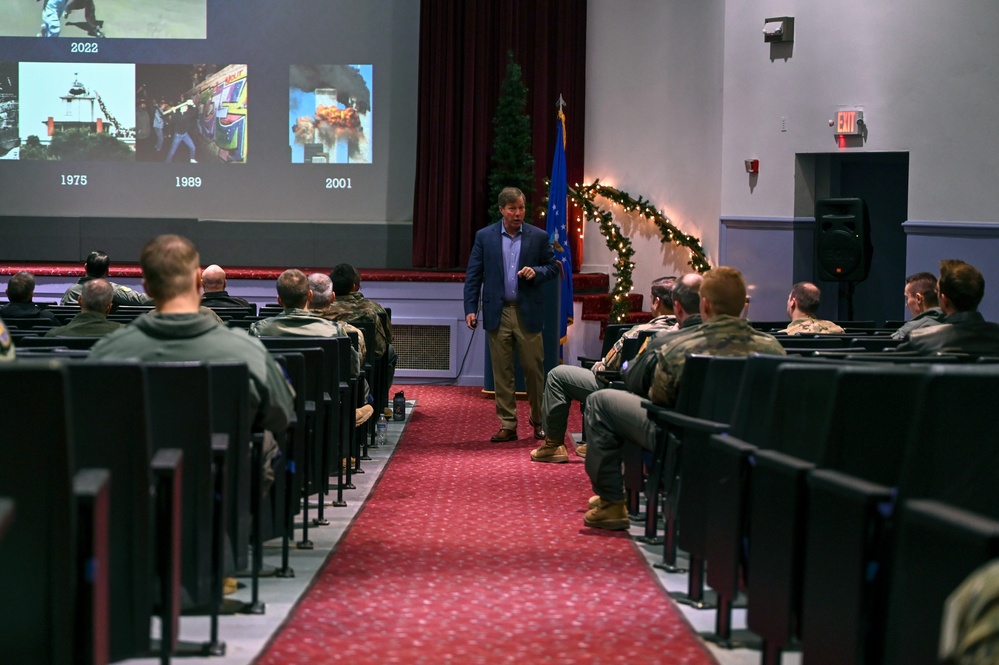 Retired Col. Harry Foster briefs Team McChord Airmen on AMC past, present, and future