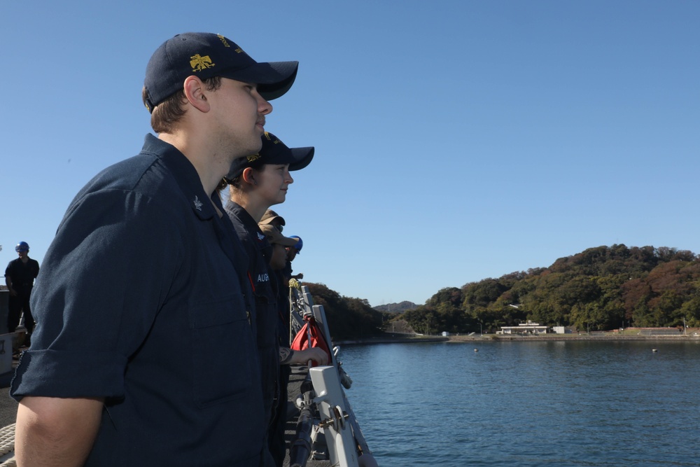 Sailors aboard the USS Rafael Peralta (DDG 115) conduct a sea and anchor detail in Yokosuka, Japan