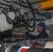 Sailors aboard the USS Rafael Peralta (DDG 115) conduct a torpedo handling event