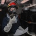 Sailors aboard the USS Rafael Peralta (DDG 115) conduct a fire drill