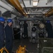 Sailors aboard the USS Rafael Peralta (DDG 115) conduct a torpedo handling event