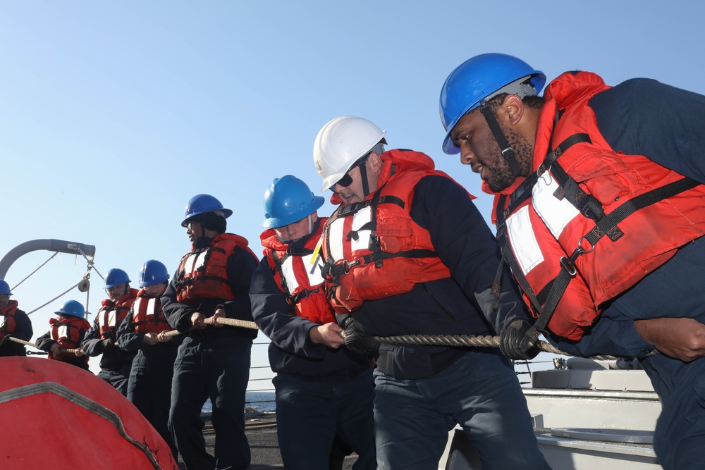 Sailors aboard the USS Rafael Peralta (DDG 115) prepare to conduct a replenishment-at-sea with the Republic of Korea’s combat support ship Dae Cheong (AOE 58)