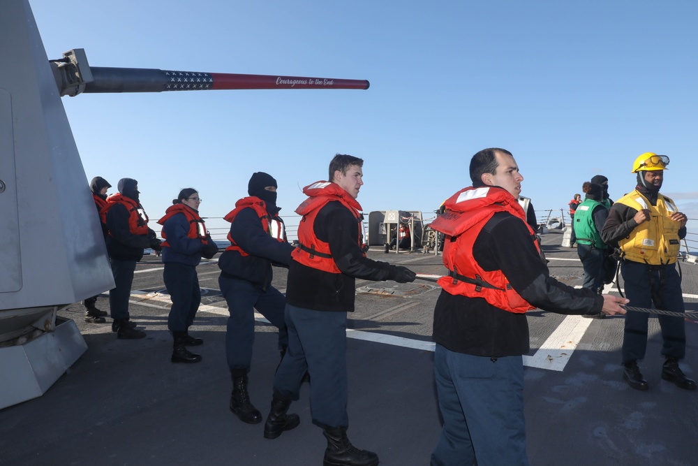 Sailors aboard the USS Rafael Peralta (DDG 115) prepare to conduct a replenishment-at-sea with the Republic of Korea’s combat support ship Dae Cheong (AOE 58)