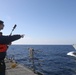 Sailors aboard the USS Rafael Peralta (DDG 115) conduct a replenishment-at-sea with Royal Canadian Navy supply ship MV Asterix in the Sea of Japan