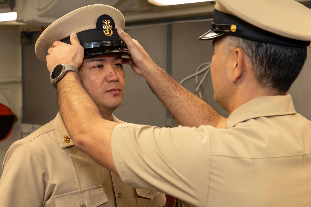 Senior Chief Retail Services Specialist Paul Mendoza Frocks to Master Chief