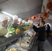 US Powidz Soldiers enjoy a Thanksgiving meal in Poland