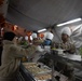 US Powidz Soldiers enjoy a Thanksgiving meal in Poland