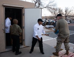 Fort Carson Soldier Cook Thanksgiving Dinner for Families in Need.