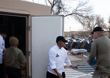 Fort Carson Soldier Cook Thanksgiving Dinner for Families in Need.