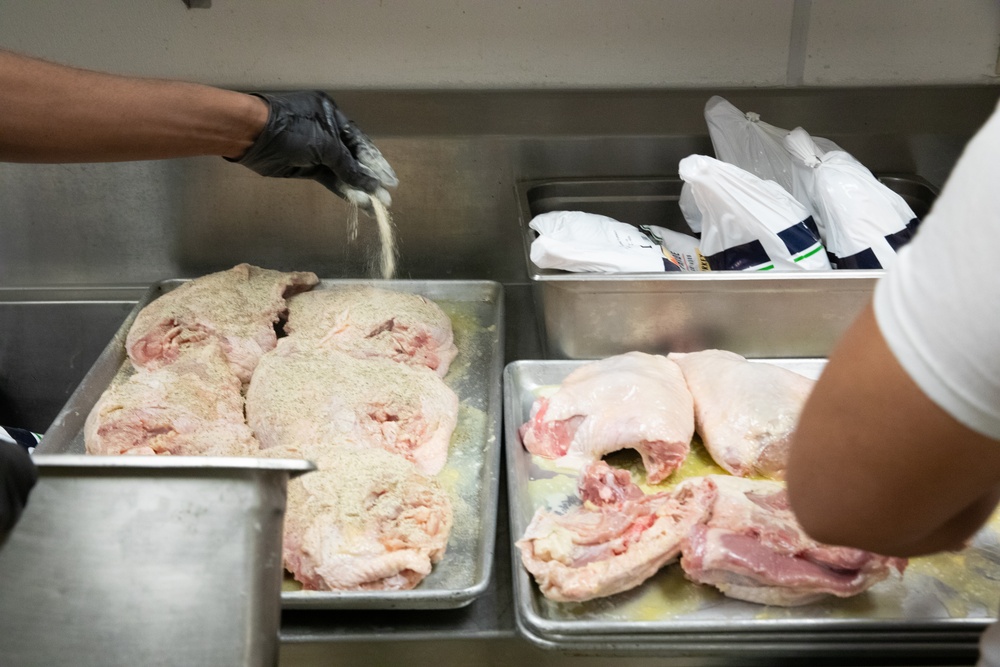 Fort Carson Soldier Cook Thanksgiving Dinner for Families in Need.