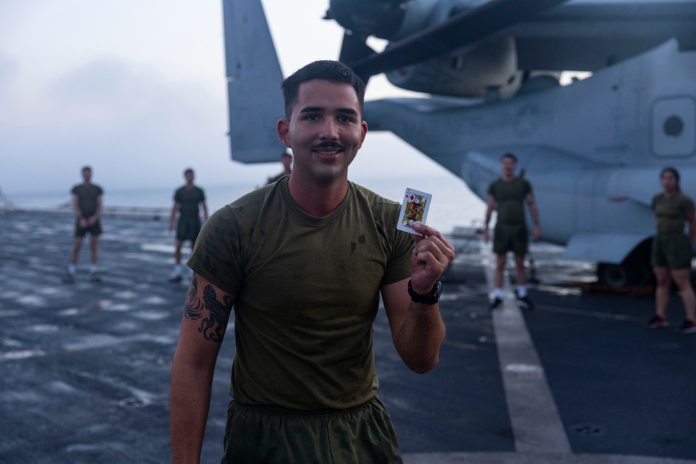 Luck of the Draw: Marines and Sailors conduct physical training during Corporal’s Course