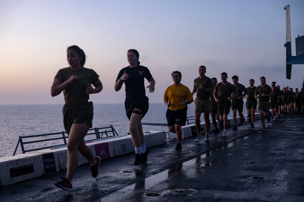 Luck of the Draw: Marines and Sailors conduct physical training during Corporal’s Course