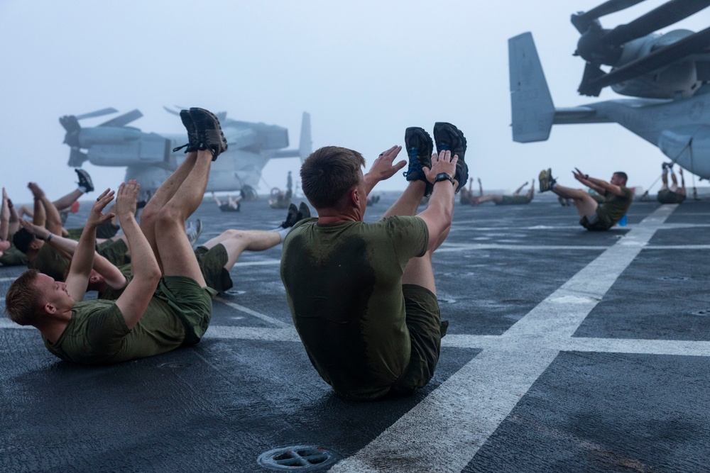 Luck of the Draw: Marines and Sailors conduct physical training during Corporal’s Course