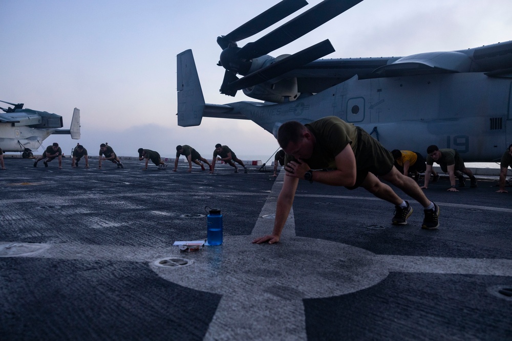 Luck of the Draw: Marines and Sailors conduct physical training during Corporal’s Course