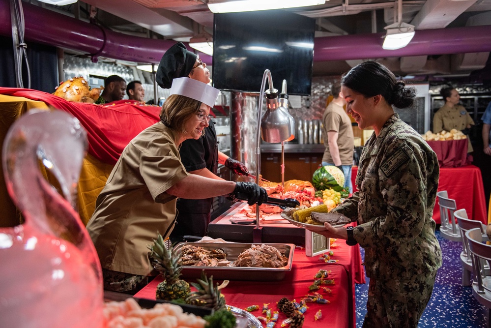 USS Ronald Reagan (CVN 76) hosts Chief of Naval Operations Adm. Lisa Franchetti and Master Chief Petty Officer of the Navy, James Honea, for Thanksgiving