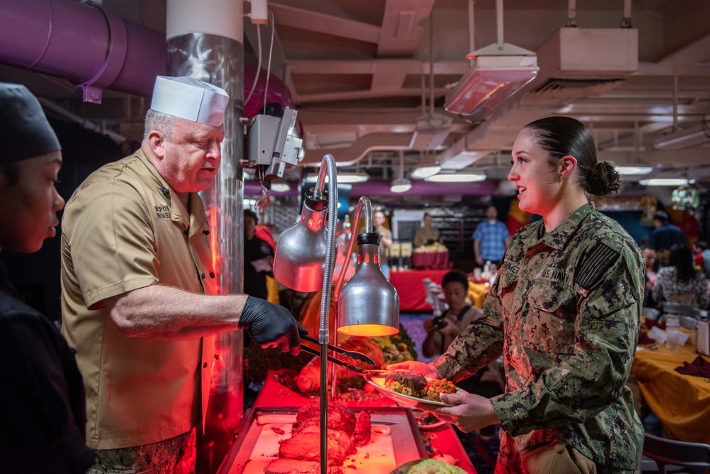 USS Ronald Reagan (CVN 76) hosts Chief of Naval Operations Adm. Lisa Franchetti and Master Chief Petty Officer of the Navy, James Honea, for Thanksgiving