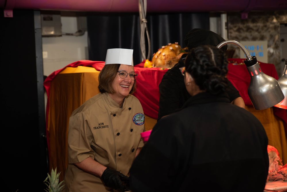 USS Ronald Reagan (CVN 76) hosts Chief of Naval Operations, Adm. Lisa Franchetti, and Master Chief Petty Officer of the Navy, James Honea, for Thanksgiving