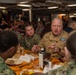 USS Ronald Reagan (CVN 76) hosts Chief of Naval Operations, Adm. Lisa Franchetti, and Master Chief Petty Officer of the Navy, James Honea, for Thanksgiving