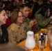 USS Ronald Reagan (CVN 76) hosts Chief of Naval Operations, Adm. Lisa Franchetti, and Master Chief Petty Officer of the Navy, James Honea, for Thanksgiving