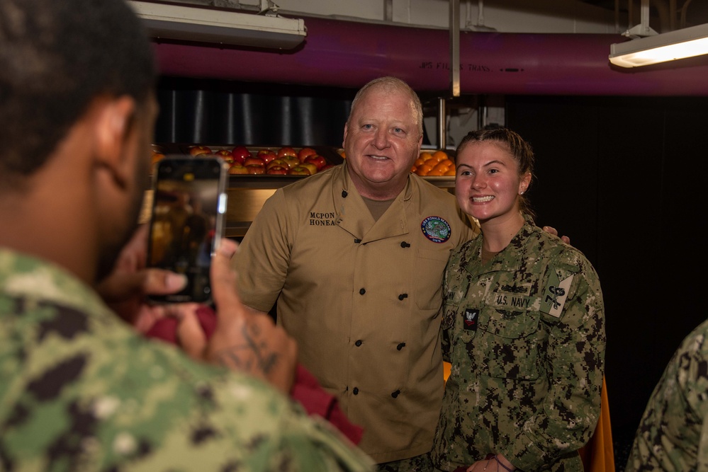 USS Ronald Reagan (CVN 76) hosts Chief of Naval Operations, Adm. Lisa Franchetti, and Master Chief Petty Officer of the Navy, James Honea, for Thanksgiving