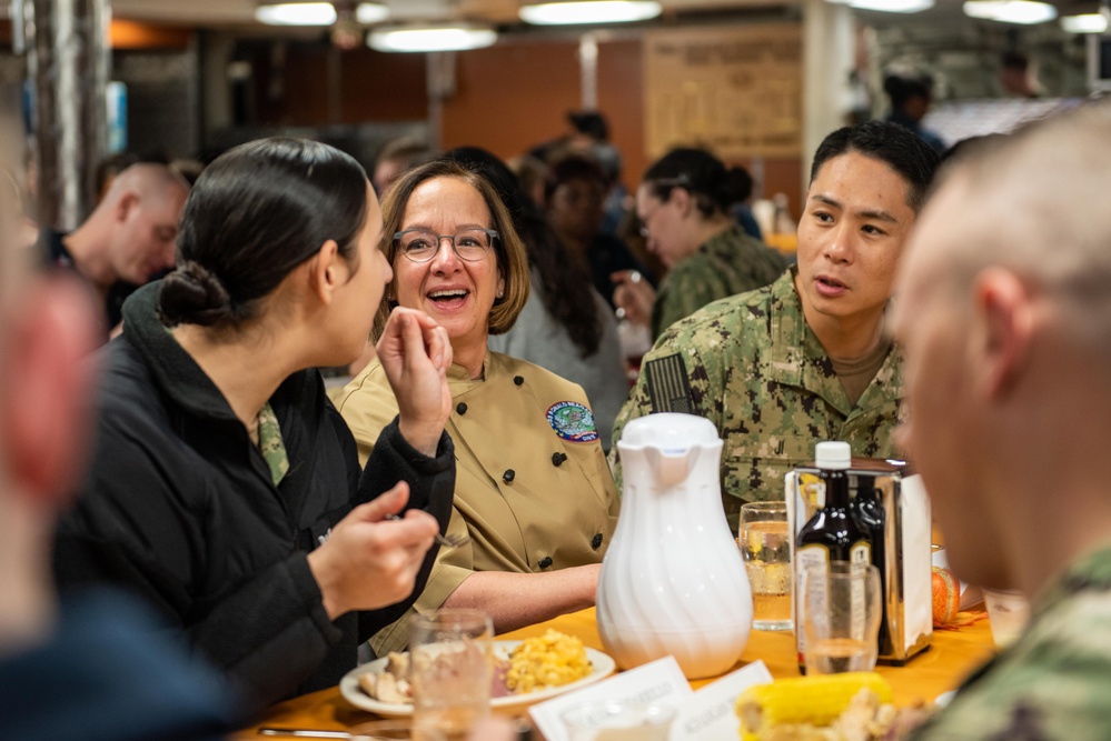 USS Ronald Reagan (CVN 76) hosts Chief of Naval Operations Adm. Lisa Franchetti and Master Chief Petty Officer of the Navy, James Honea, for Thanksgiving